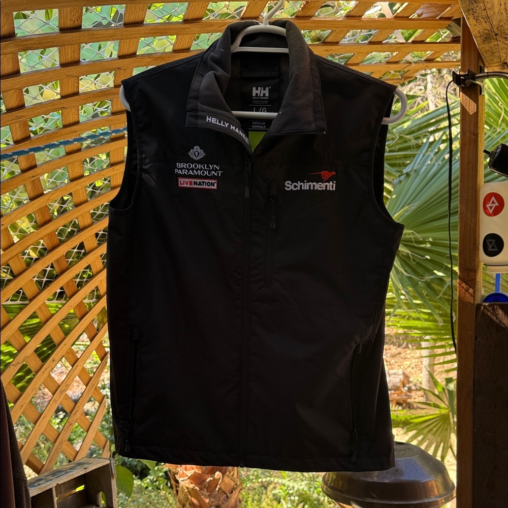 New Helly Hansen. Black Sleeveless Jacket. Seamed, Gortex material.